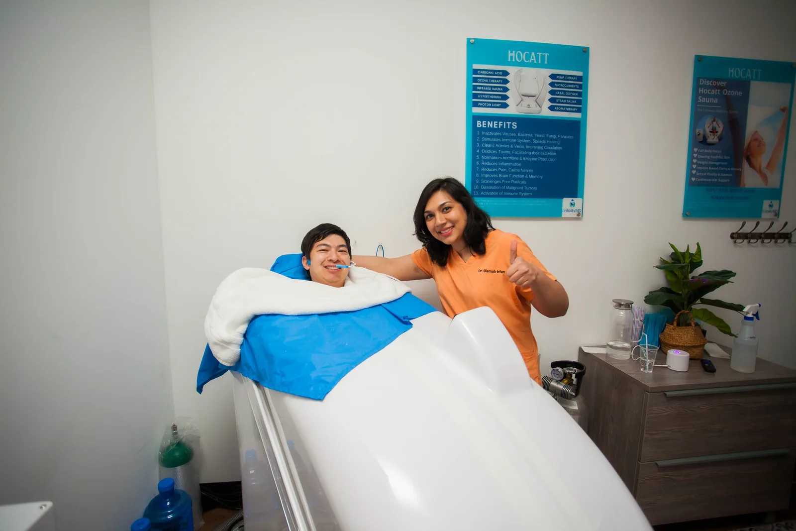 Patient during a HOCATT ozone sauna session at iVitality MD in Houston, with Dr. Bismah Irfan